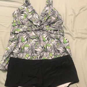 A green, black & white bathing suit